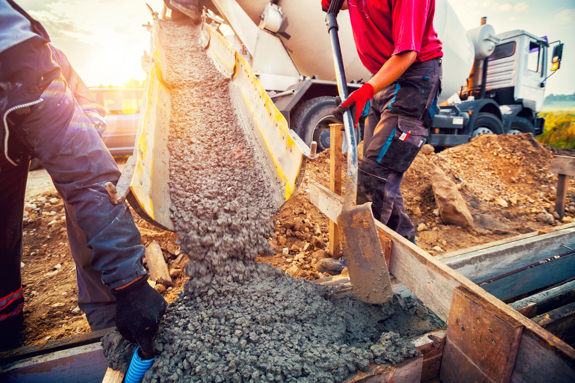 Pouring concrete to the foundations of the building